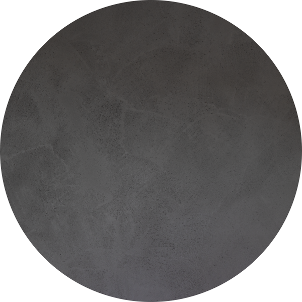 Une surface texturée gris foncé présentant de subtiles variations et des nuances irrégulières, qui rappelle le béton ou le crépi. Le motif confère à l'ensemble un aspect légèrement tacheté et brut.