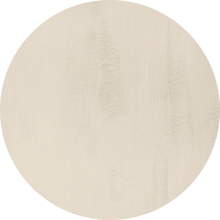 Une surface ronde et plate avec une finition lisse, légèrement beige et une texture subtile à coups de pinceau.