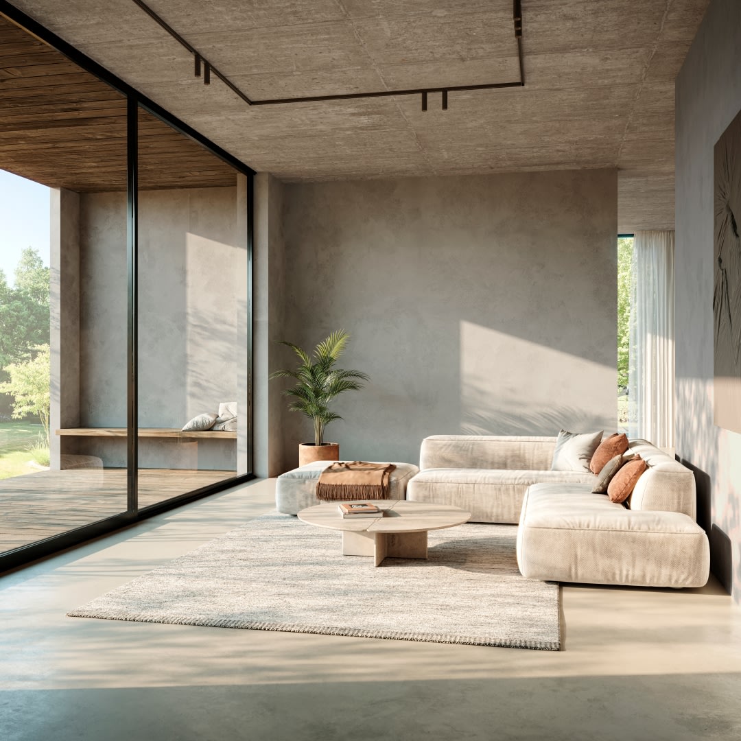 Moderne woonkamer: Sandrock afwerking die doorgetrokken wordt van buiten naar binnen.