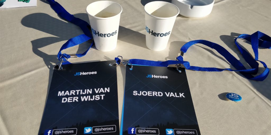 Sjoerd  Martijns JSHeroes badges with JSHeroes coffee cups and a JSHeroes button