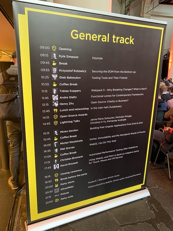 A sign showing the schedule for JSNation talks