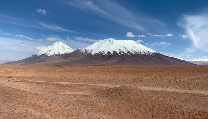 Licancabur and the Juriques Volcanoes, the Atacama Desert at 4,630 meters (15,190.29 feet) above sea level, Chile/Bolivia.