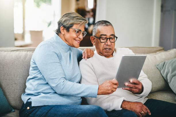 Older couple utilizing remote patient monitoring