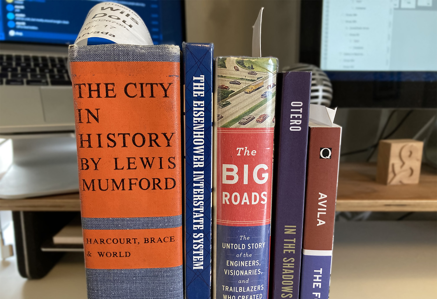 Books currently on my desk and in various stages of reading