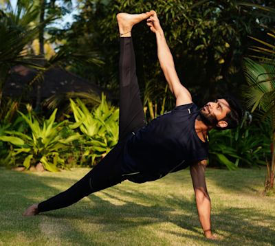 One-legged side plank pose by Subham Sri. One-legged side plank pose by Subham Sri.