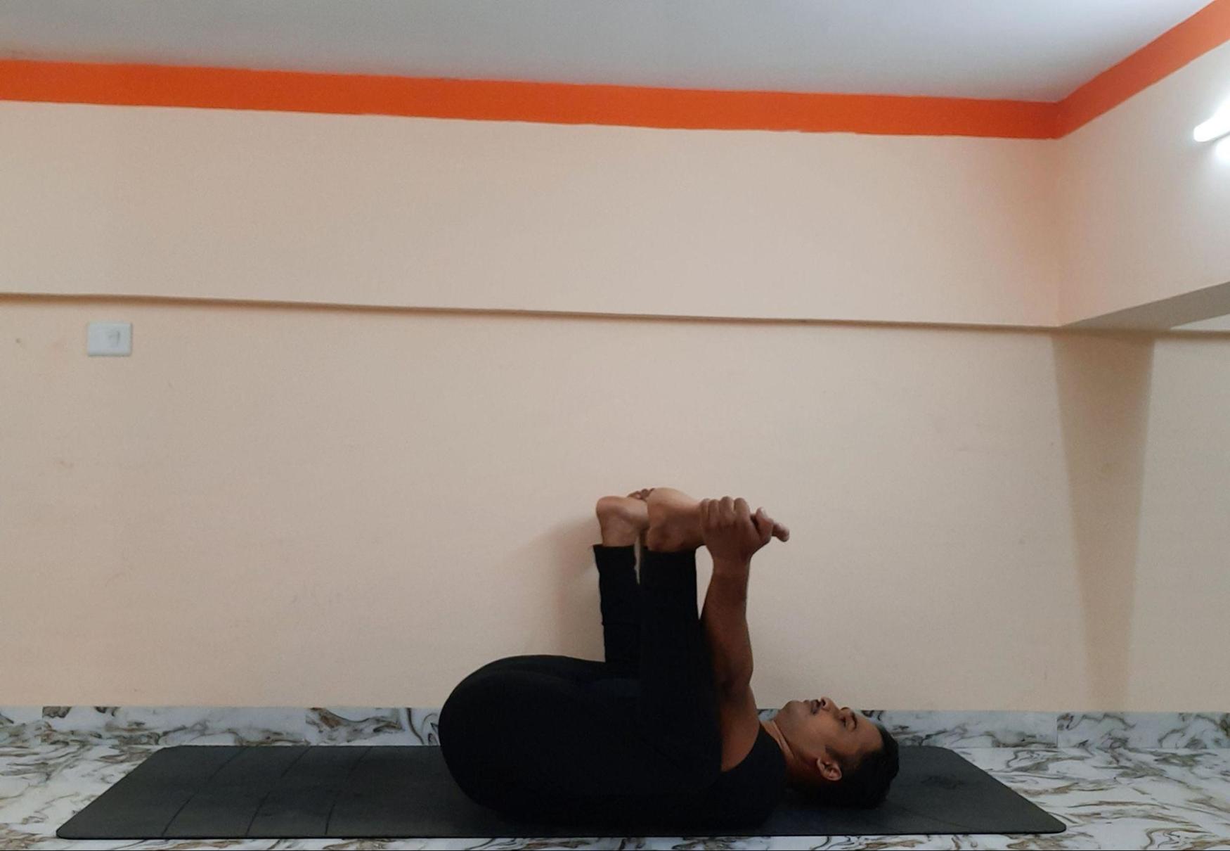 Anandha Balasana - Happy baby pose