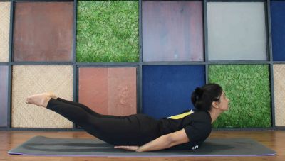 Shalabasana by Teena Hooda. Shalabasana by Teena Hooda.