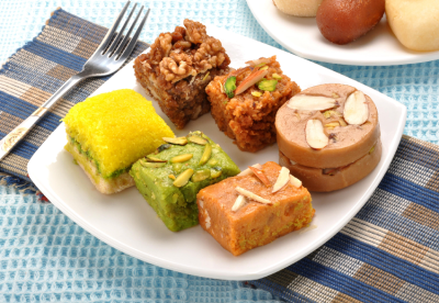 A picture showing a plate full of sweets. A picture showing a plate full of sweets.