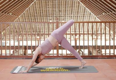 Three-legged dog pose by Aishwarya Tomar. Three-legged dog pose by Aishwarya Tomar.