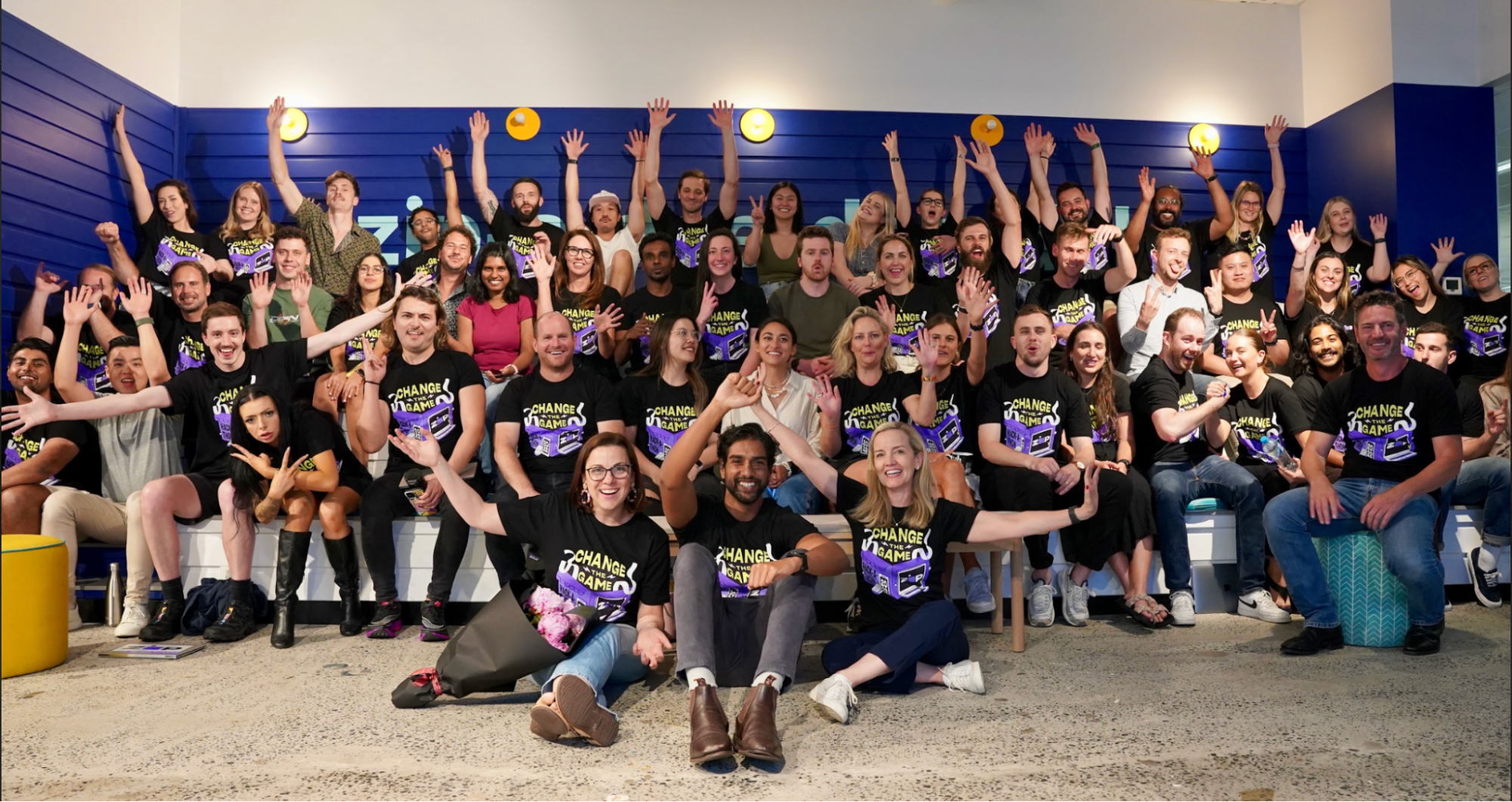 Zipsters wearing their shirts for the 2023 ANZ Zipster Hackathon.