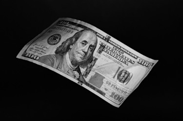 dollar bill falling