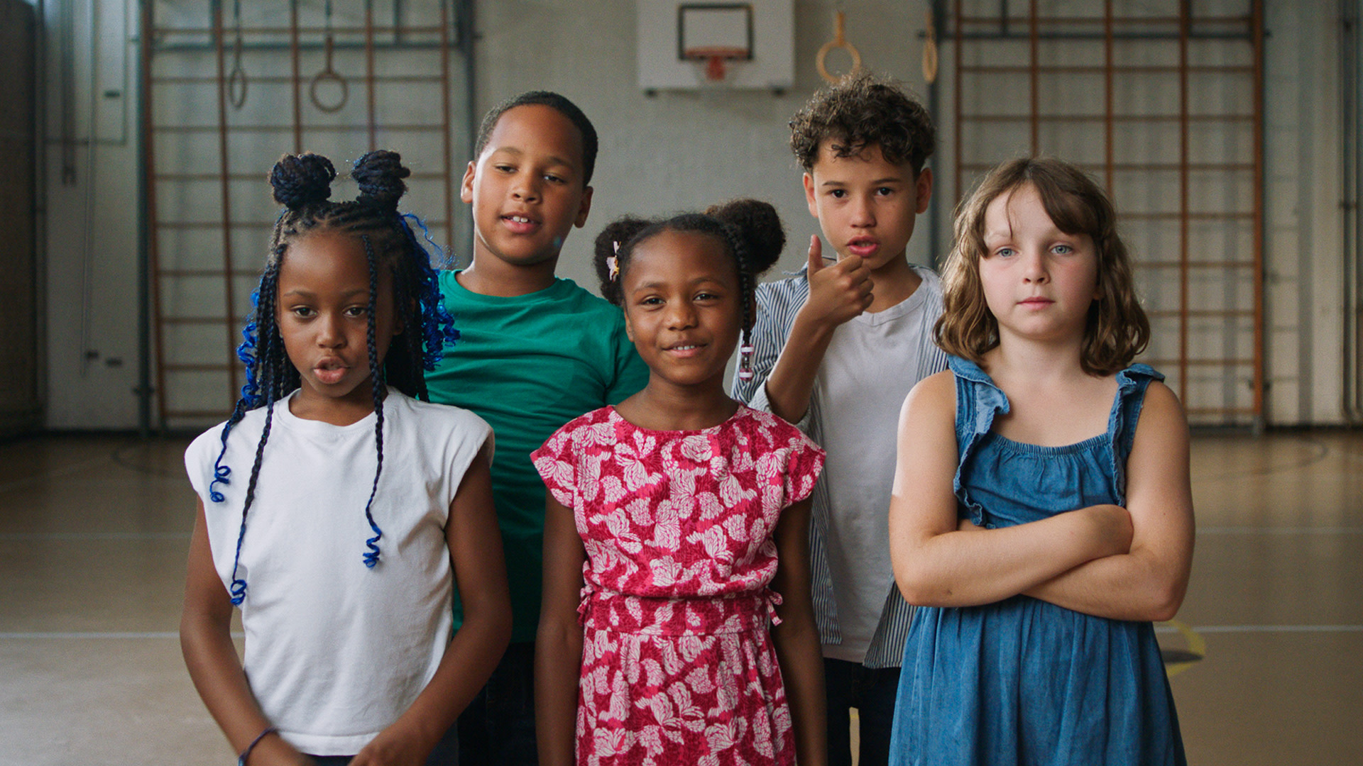 Children in gymnasium for exploring campaign