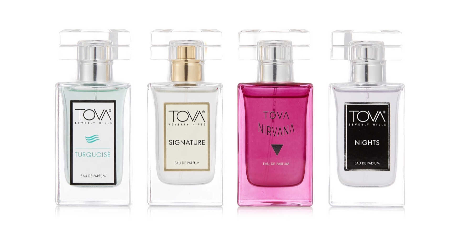 Four bottles with Tova labels, three clear, one magenta.