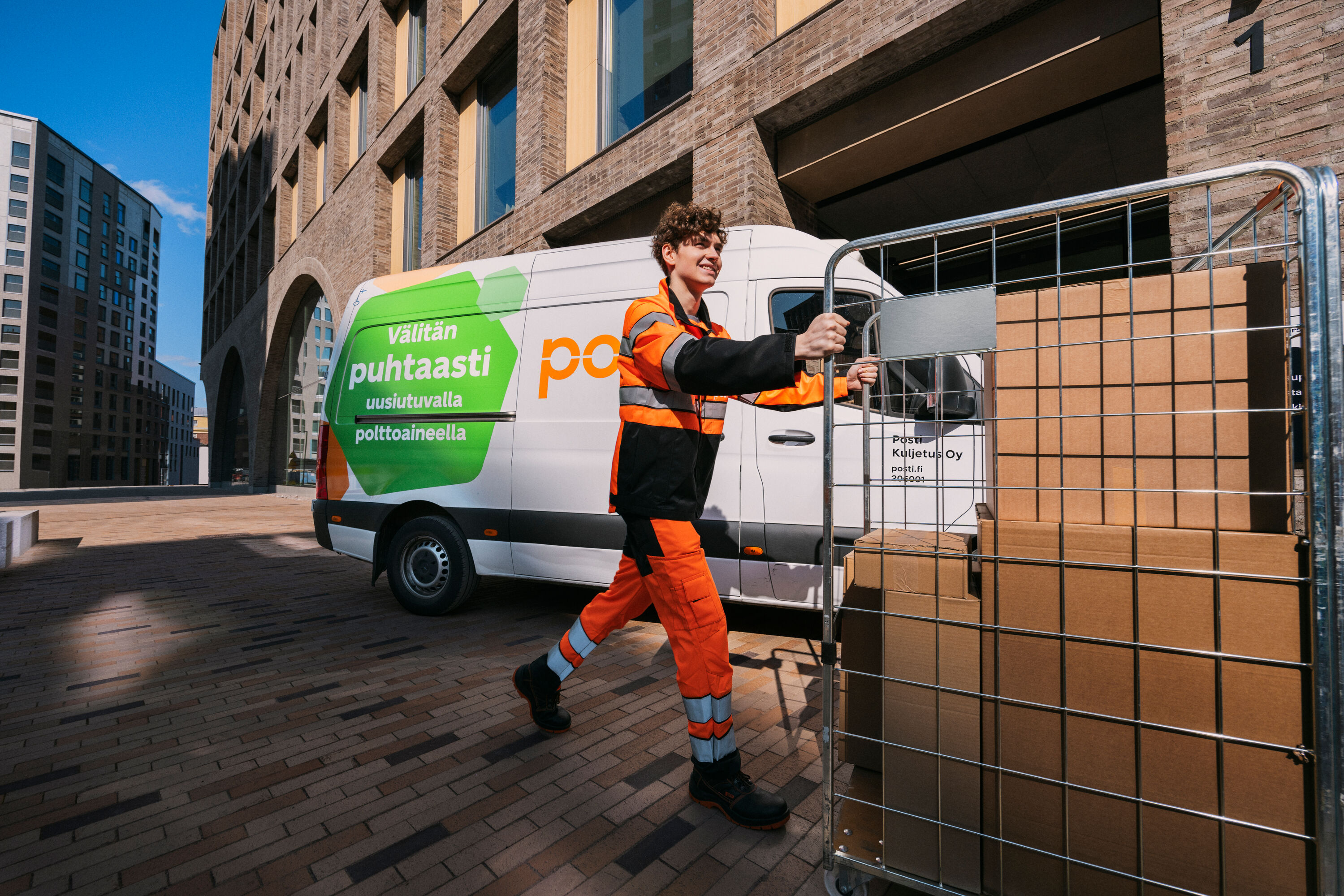 An employee is pushing a trolley.