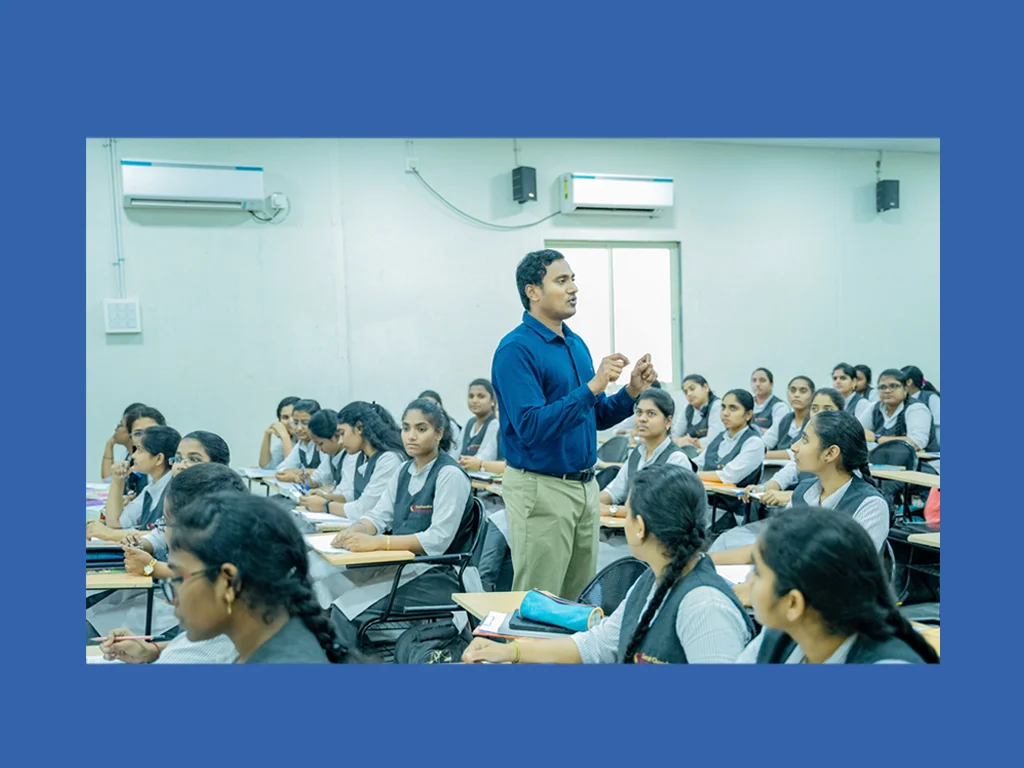 Female students attending a classroom session at Sarat Chandra Academy.