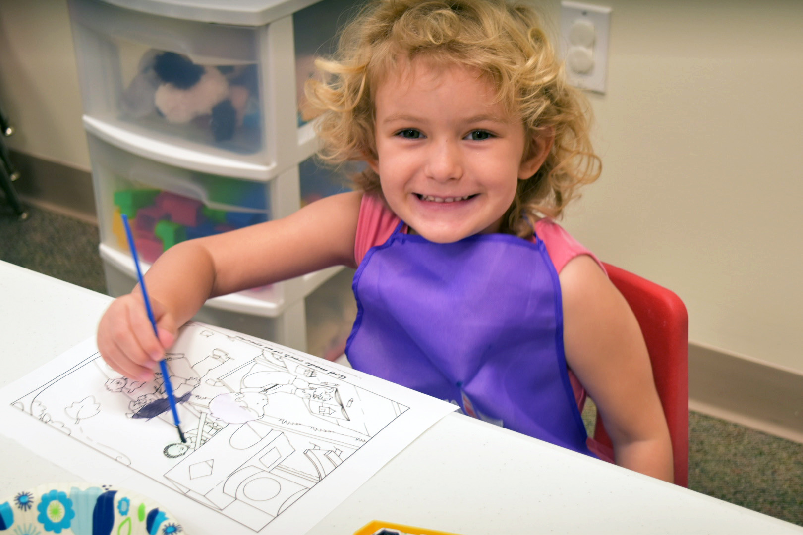 little girl painting