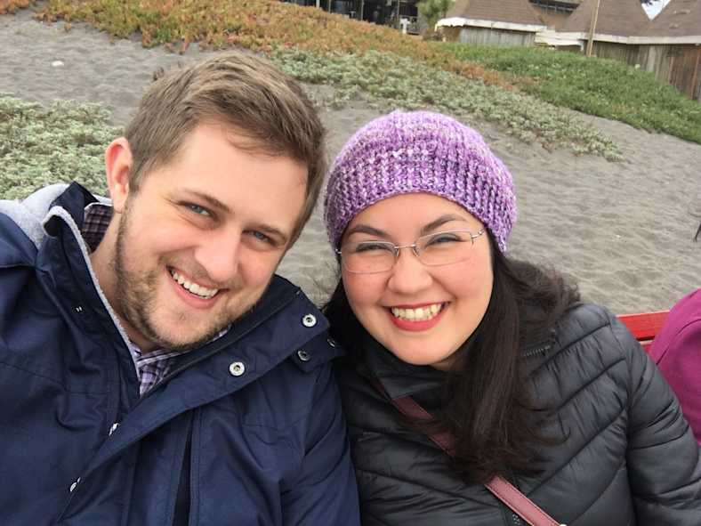 man and woman smiling