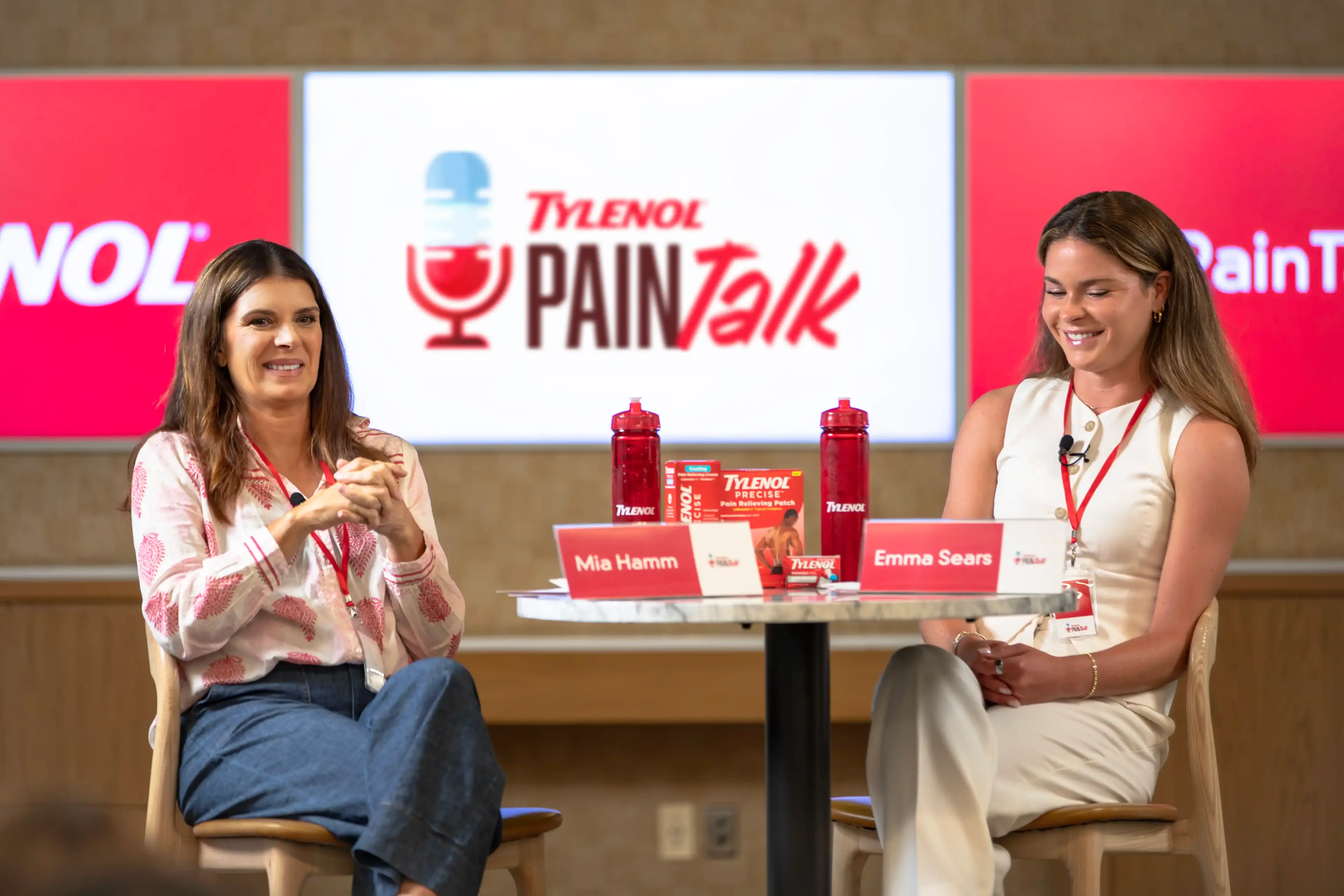 Soccer legend Mia Hamm (left) and active NWSL and U.S. international player Emma Sears (right) participate in the launch of TYLENOL® PainTalk.