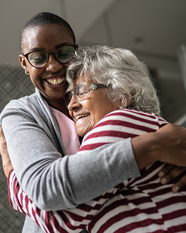 Two women hugging