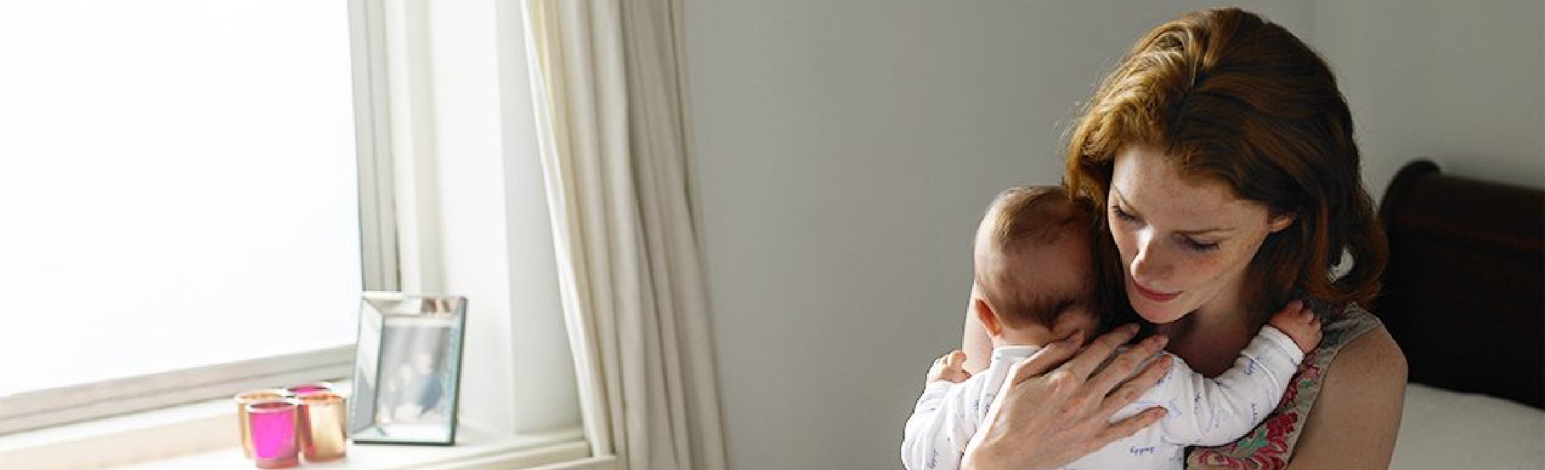 Parent comforting sick baby