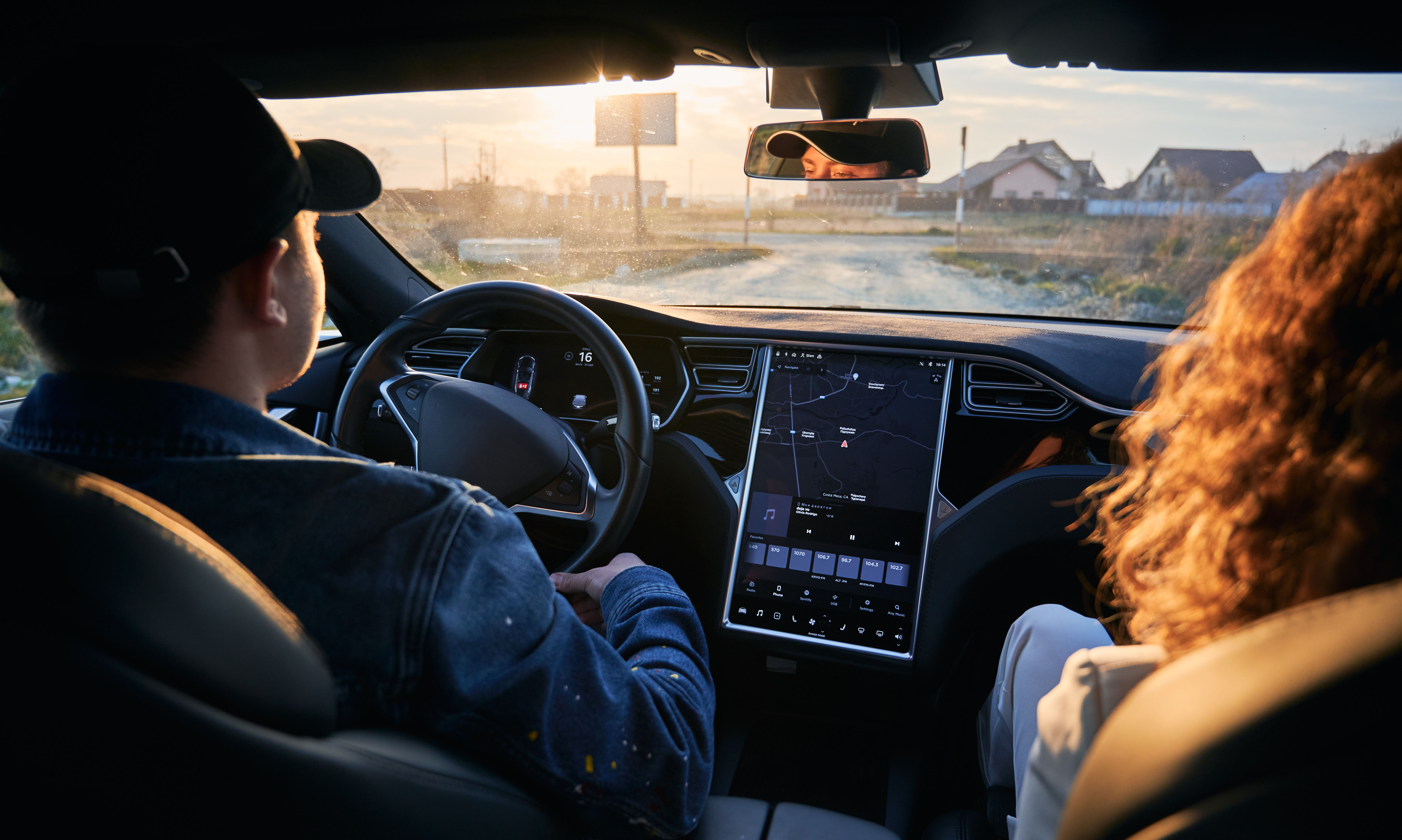 driver-and-one-passenger-riding-at-automobile-in-t-2025-01-16-23-42-52-utc