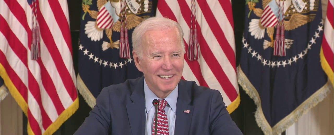 Biden laughs at reporter asking if Trump indictment is 'politically divisive'