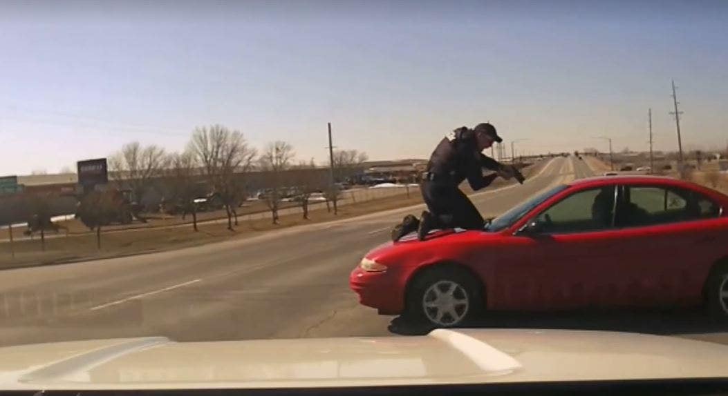 Iowa police officer clings to hood of car during dramatic chase, suspect sentenced to 5 years