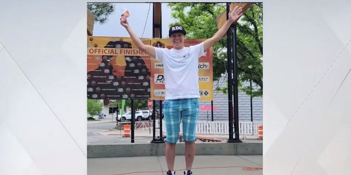 Man who won women's cycling race stands alone on podium after female competitors refuse to join him