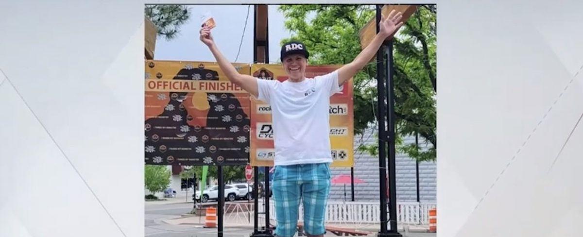 Man who won women's cycling race stands alone on podium after female competitors refuse to join him