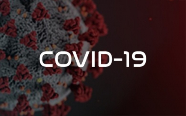 a coronavirus spike protein with the words covid - 19 in bold white font at the centre.