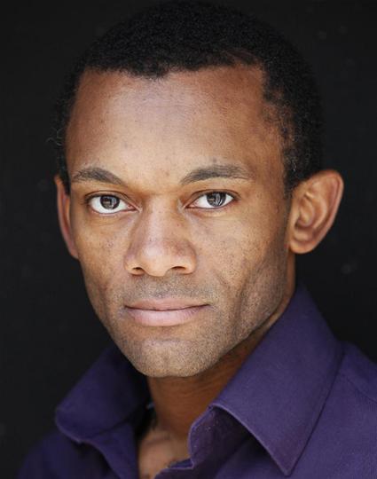 a close up headshot of actor Jason Pennycooke.