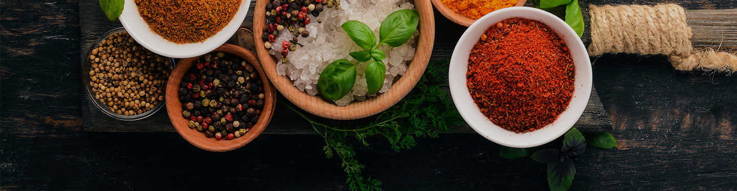 A set of spices in a rustic setting