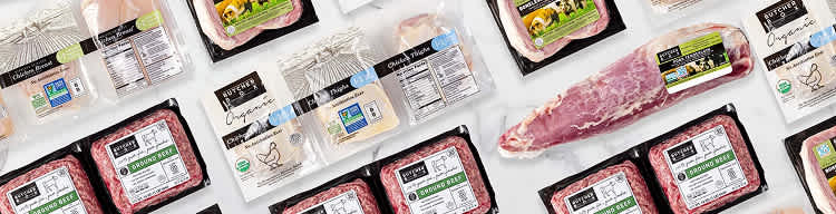 Butcherbox packaged meat on a marble countertop
