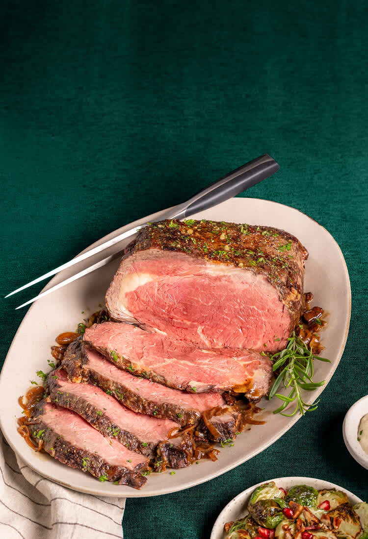 Ribeye Roast on green background