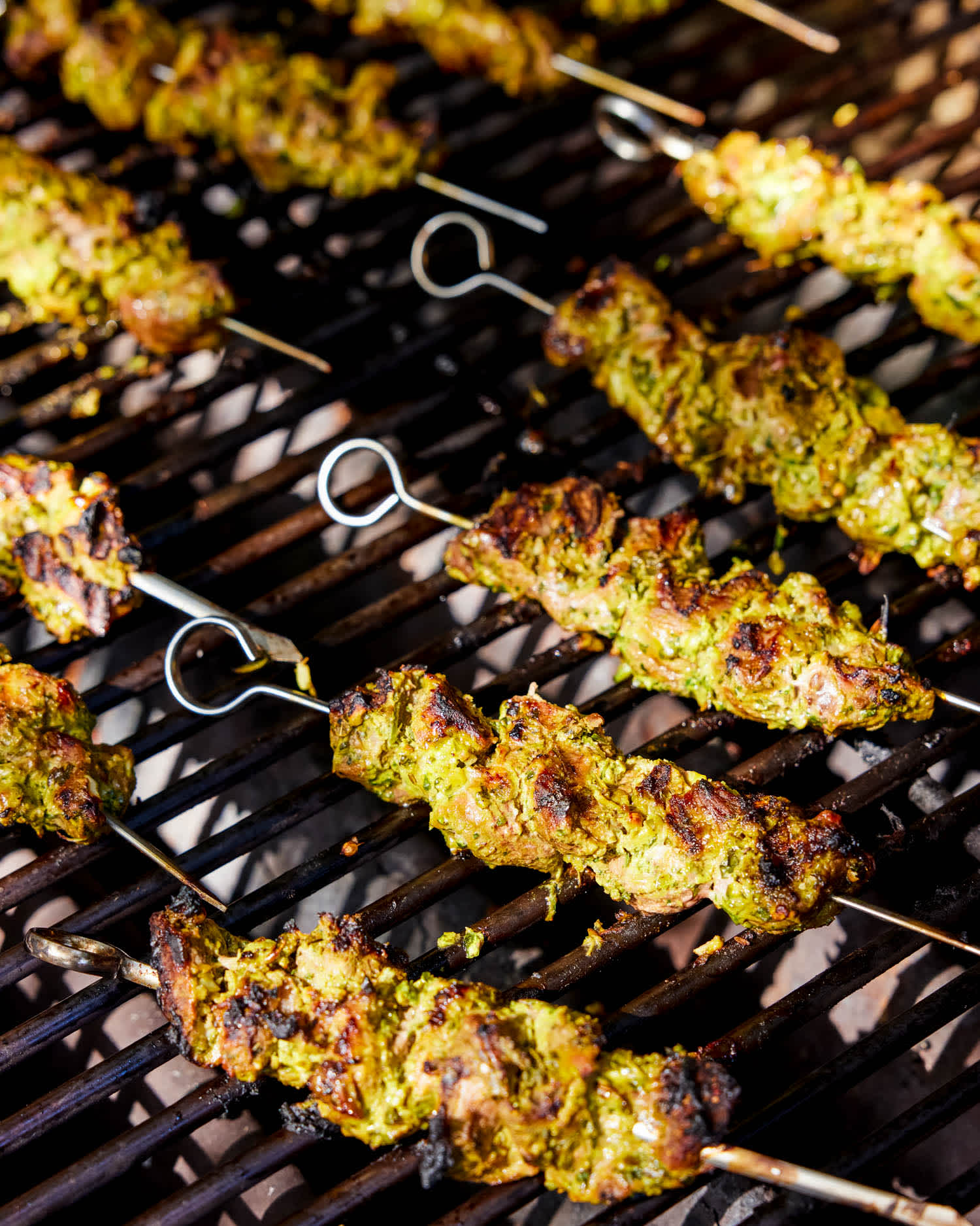 Chicken skewers on grill