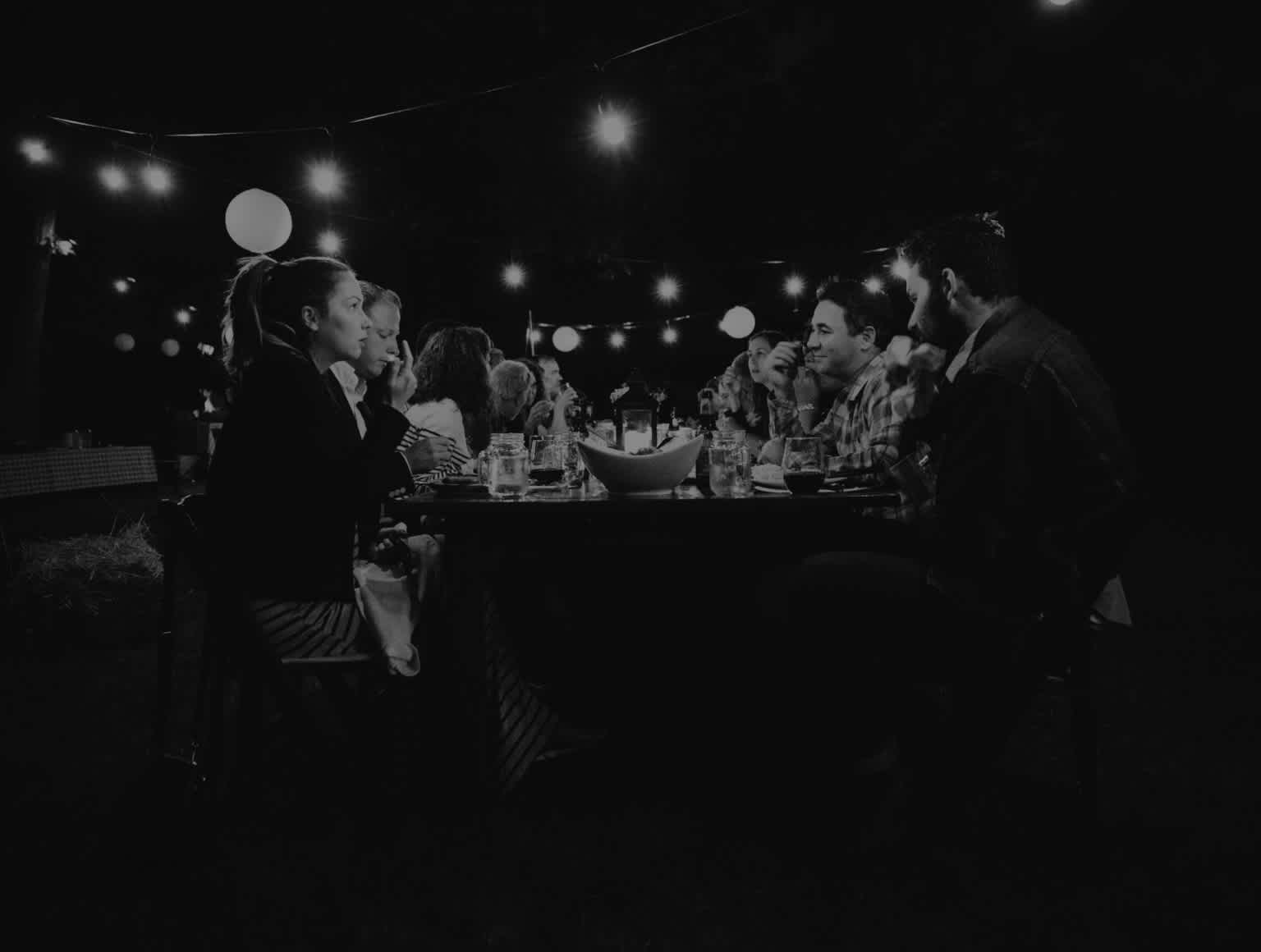 group of people sitting around a table