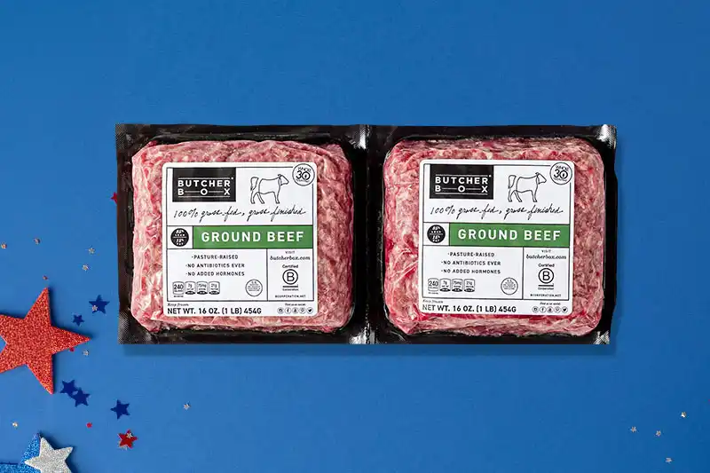 Packaged ground beef on blue background