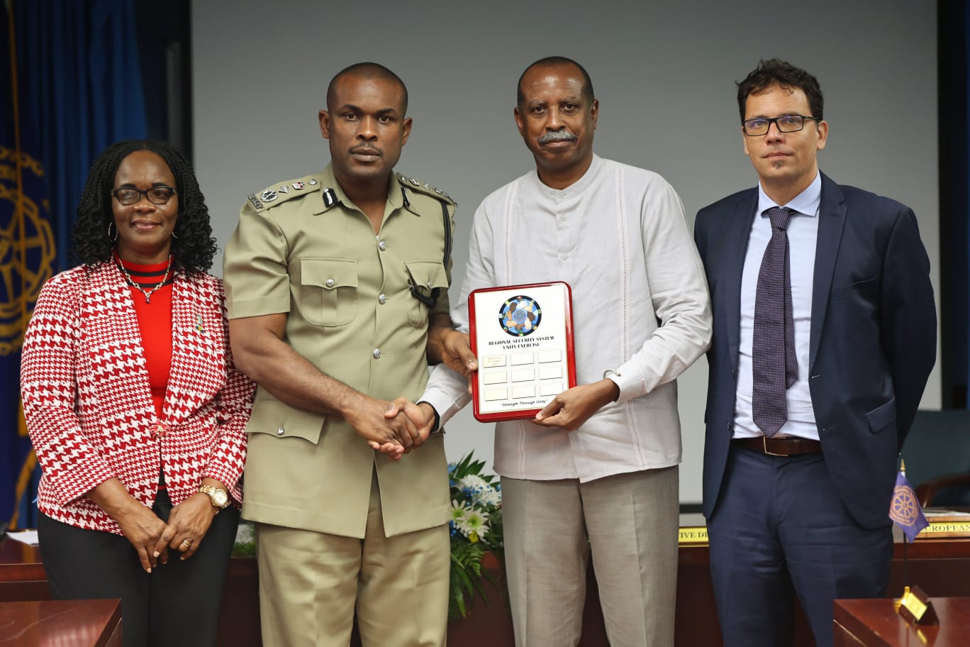 (L-R) Minister of Public Service, Home Affairs, Labour and Gender Affairs, St. Lucia, Dr. Virginia Albert-Poyotte; Commissioner of the Royal St. Lucia Police Force (Ag.), Ronald Phillip; Executive Director of the RSS, Commodore Errington Shurland and Attaché – Security, Justice & Human Rights Delegation of the European Union (EU) to Barbados, the Eastern Caribbean States, the OECS and CARICOM/CARIFORUM, Alessandro Tedesco, during the handover of the Unity Exercise plaque.