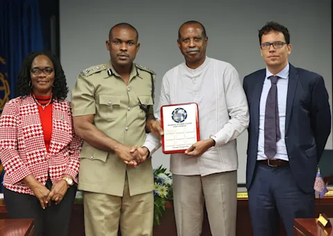 (L-R) Minister of Public Service, Home Affairs, Labour and Gender Affairs, St. Lucia, Dr. Virginia Albert-Poyotte; Commissioner of the Royal St. Lucia Police Force (Ag.), Ronald Phillip; Executive Director of the RSS, Commodore Errington Shurland and Attaché – Security, Justice & Human Rights Delegation of the European Union (EU) to Barbados, the Eastern Caribbean States, the OECS and CARICOM/CARIFORUM, Alessandro Tedesco, during the handover of the Unity Exercise plaque.