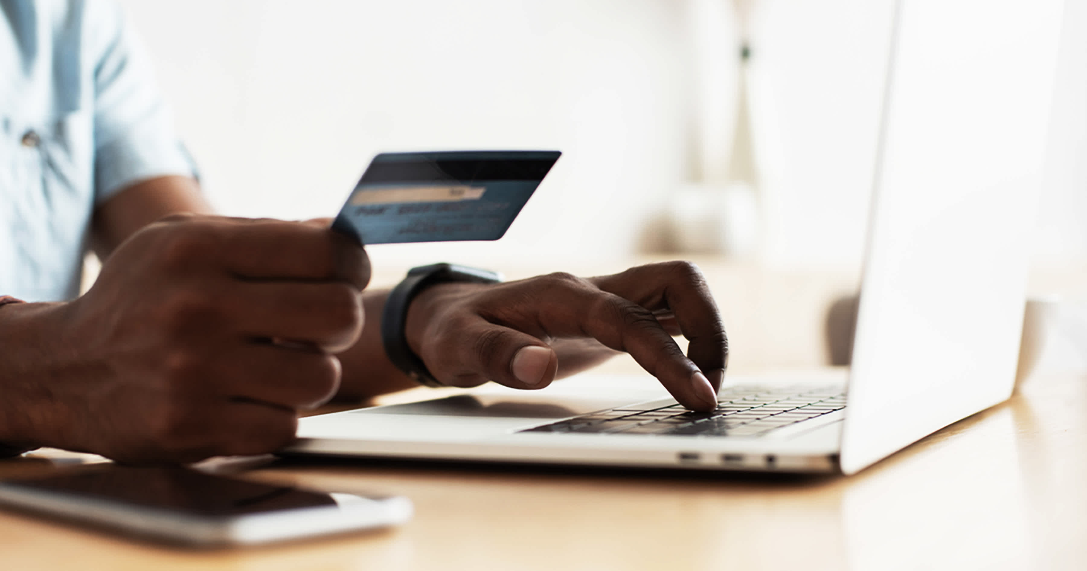 Man holding credit card