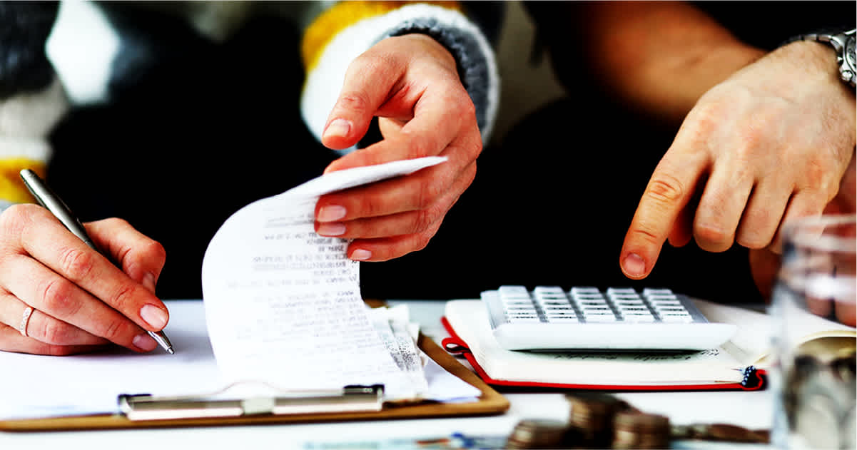 Student looking at bills