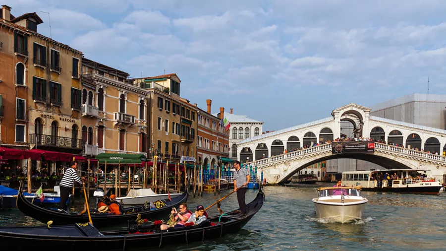 Your Venice walking tour begins near the famous Rialto Bridge.
