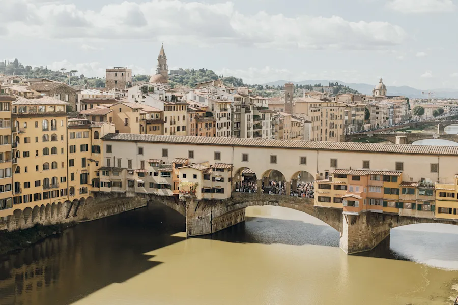 The Vasari Corridor is an elevated covered walkway over the famous Ponte Vecchio and Arno River