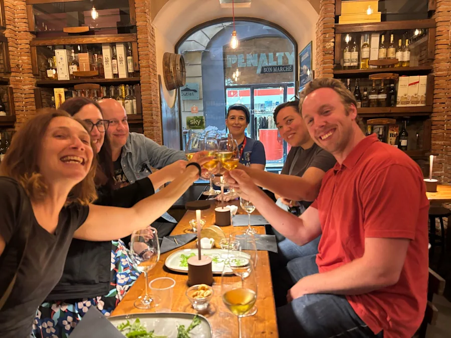 Tuck into a cozy wine bar for aperitivo with your small group and local guide.