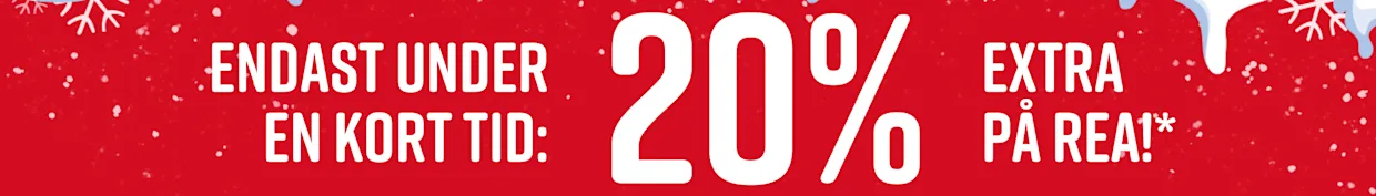 Röd skylt med vit text 'Endast för en kort tid: 20% extra på rea!' framför en blå, snötäckt bakgrund. Snöflingor syns.
