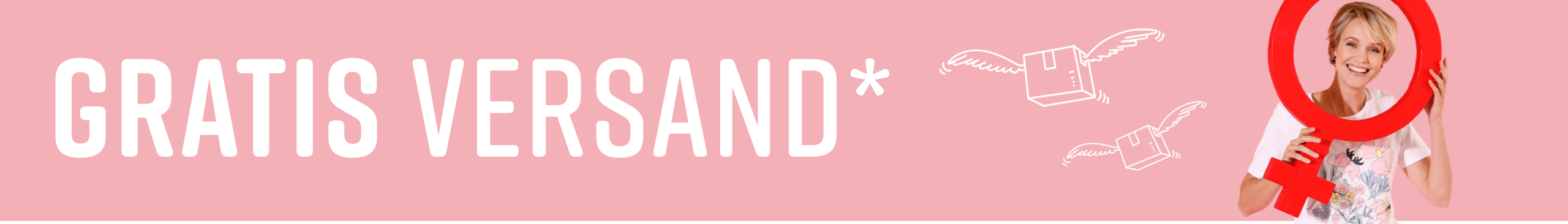 Ein Model hält einen großen roten Frauen-Symbol-Ring vor sich, trägt ein weißes T-Shirt mit floralem Druck vor rosa Hintergrund. Gratis Versand wird ausgelobt.