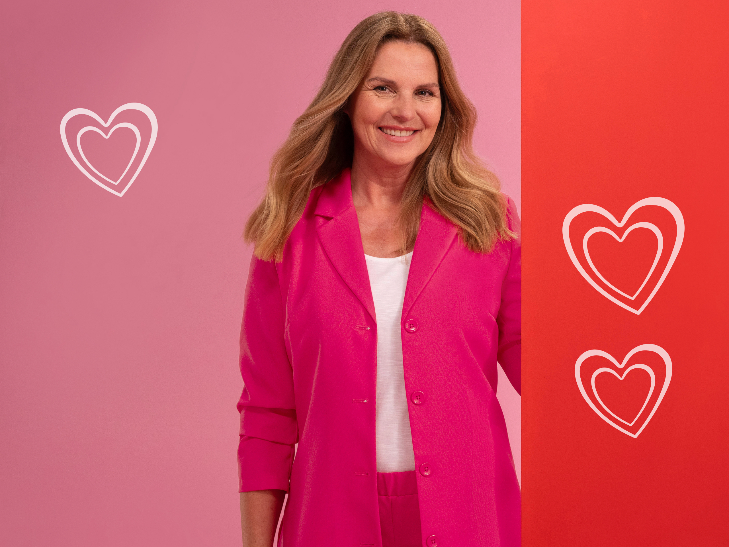 Frau mit pinkem Blazer