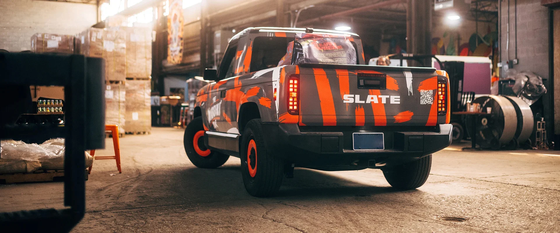 Orange stripe Slate Truck in factory setting