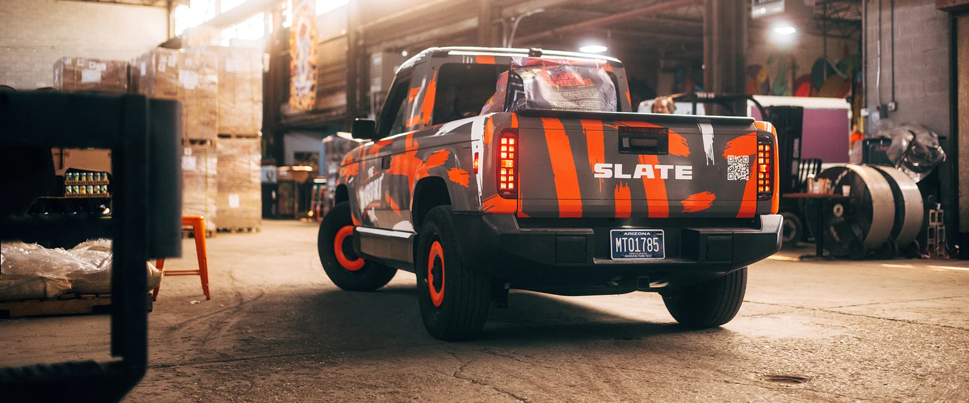 Orange stripe Slate Truck in factory setting