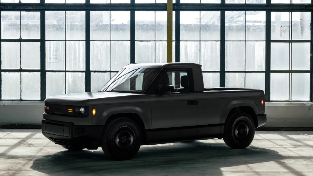 side view of Slate truck with windows in background